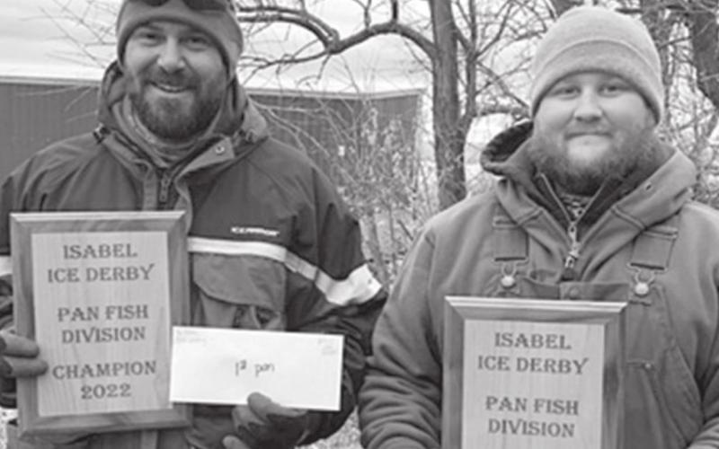 ABOVE: Josh Lemburg (LEFT) and Ty Olson took top honors in the panfish division at the 8th Annual Lake Isabel Ice Fishing Tournament on Saturday, Jan. 22, with a total weight of 7.36 pounds.