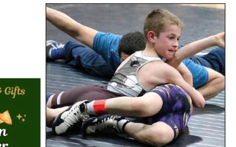 Crawford Maher of the Timber Lake Youth Wrestling Club tries to pin Kip Longbrake of Dupree during the Panther Invite last Thursday, March 1. Photos by Jon Flatland