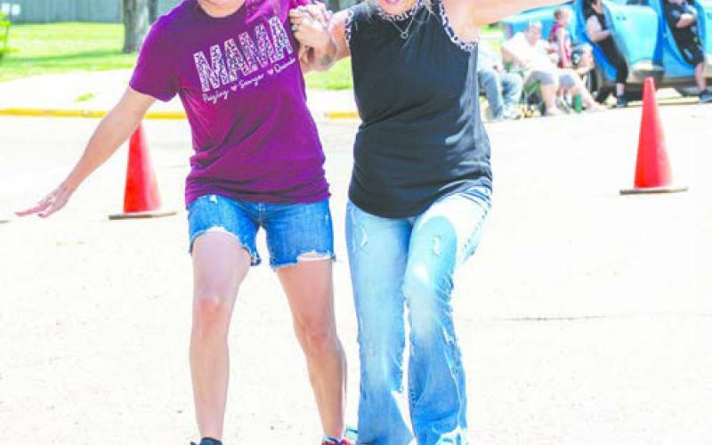 Jazmyn Holmes and Makense Wall in the three legged race