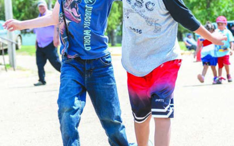 Jack Keckler and Ares Carlson in the three legged race