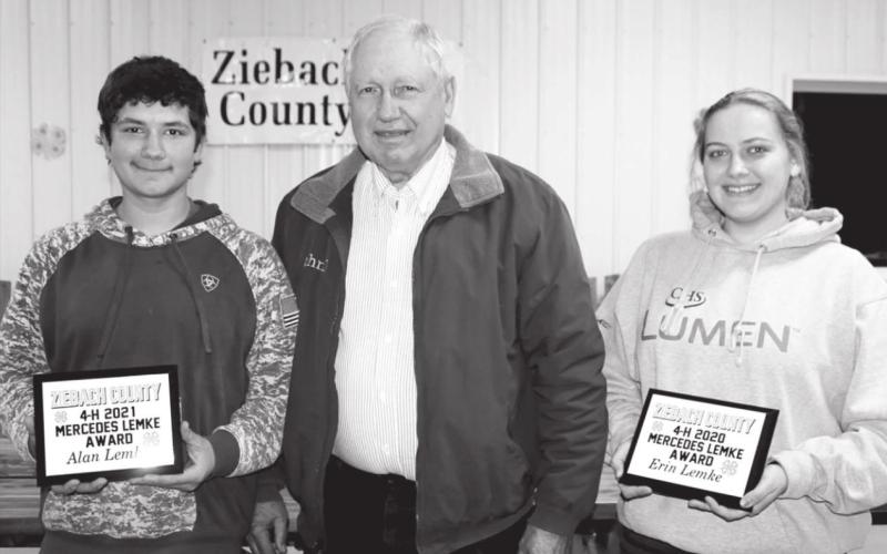 For the first time, because of the event honoring 2020 and 2021, there were two 4-H members presented with plaques for being chosen for the honor of receiving the Ziebach County 4-H Mercedes Lemke award. The award is in memory of Mercedes Lemke who was a foundational person in the county and state 4-H programming. (L-R): Alan Lemke-chosen for the 2021 4-H year, John D Lemke (one of Mercedes’ sons), and Erin Lemke-chosen for the 2020 4-H year.