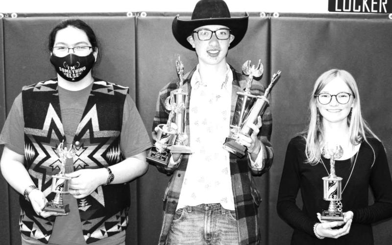 McIntosh High School students winning trophies at the NWAS Academic Olympics were (L-R): Sebastian Moore, Kade Conner and Kathryn Volk.