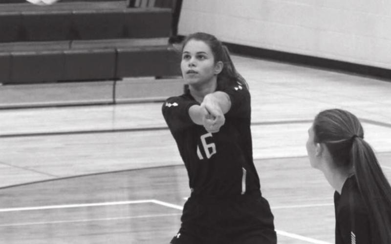 ABOVE: Timber Lake’s Manuela Molinera-Munoz bumps a serve back over the net.