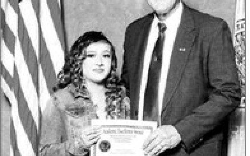 Jaheida Two Crow of Tiospaye Topa High School and Lt. Gov. Larry Rhoden