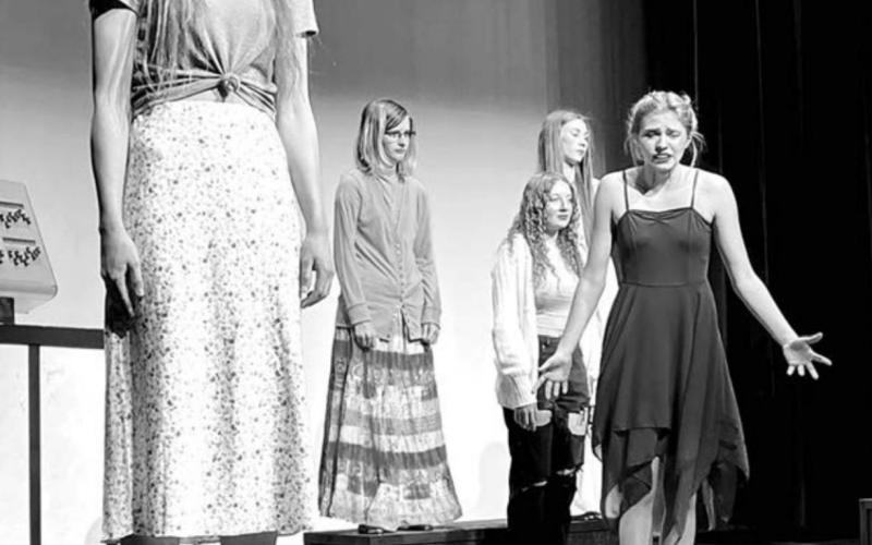 The automated figures begin to come alive. L-R are Natalie Gross, Kendal Lemburg, Maddie Bieber, Averie Marshall and Natalie Biegler.
