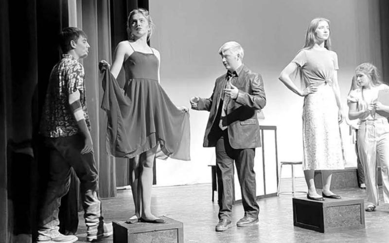 Shawn Quinn as Kyle McManus (CENTER) tries to sell his “art” to Mike and Ruby Pushtin. L-R are Wylee Keller as Mike Pushtin, Natalie Biegler (Figure 3), Quinn, Natalie Gross (Figure 1), and Abby Linderman (Ruby Pushtin).