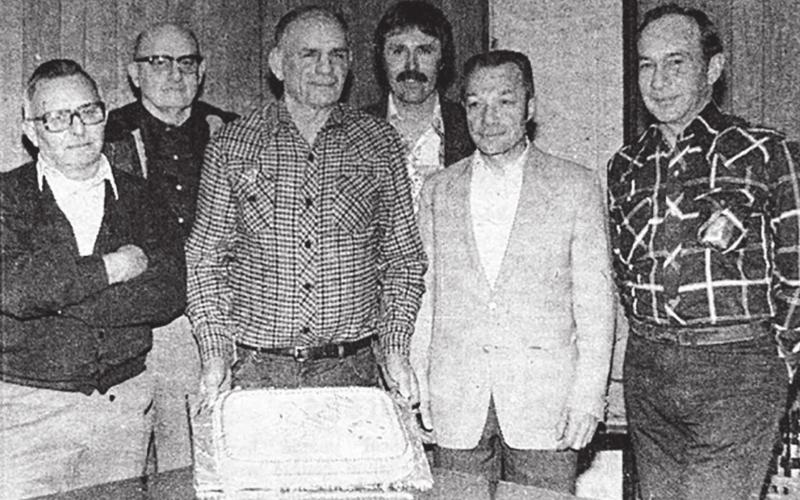Members of the Gene Gelino American Legion Post were presented with a birthday cake last Tuesday to mark the post’s birthday. The cake, decorated in red, white, and blue, was baked by the Past Presidents of the American Legion Auxiliary and enjoyed by the veterans at their meeting. Pictured above are the Legion officers (L-R) Ken Reed, Dean Fett, Gilbert Elder, Jack Bickel, Andy Aberle, and Jim Hulm. Timber Lake Topic, March 25, 1982