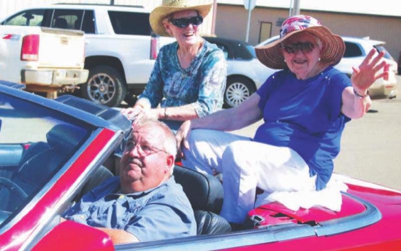 Marty Biegler chauffeured the parade marshals, Jean Tehle and Mary Biegler, in his convertible.