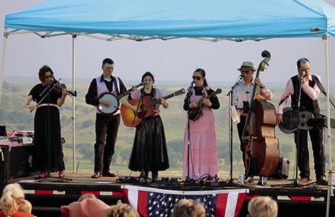 The Triple R Ranch south of Isabel hosted the Georgia-based family bluegrass and gospel band Headin’ Home for two performances on Sunday, July 21. Guests enjoyed a beautiful evening for the outdoors performances with the Moreau River Valley as a backdrop. Photo by Jon Flatland