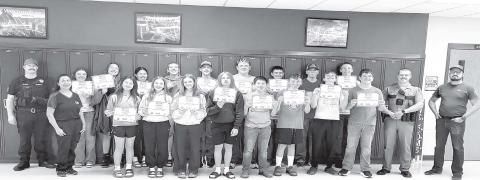 Students and instructors at the Stop the Bleed training, front (l-r): EMT/Instructor Sylvia Mowrer, Leah Eigelaar, Grace Keller, Lily Handeland, Ryan Angsman, Glen Mowrer, Max Johnson, Mason Kraft, Luke Biegler, SD Highway Patrolman Ryan Serr, EMT/ Instructor G.J. Castaneda; Back: EMT/Instructor Kyle Nilson, Rosaleigh LaChance, Tessla Ducheneaux, Oaklee Mutchler, Cheyienna Nygaard, Isaac Zeug, Kayne Palmer, Emmett O’Leary, Aiden Lindskov, and Maddoc Boysen.