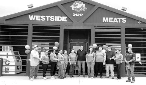 A ribbon cutting was held Friday, September 4 for the new Eagle Butte location of West Side Meats. The CRST Buffalo Authority Corporation also operates West Side Meats in Mobridge and West Side Meats C Store in LaPlant. Cheyenne River Sioux Tribe Chairman Ryman LeBeau (center) and CRST Council member Joseph Brings Plenty, Sr.(right) were among those participating in the ribbon cutting.