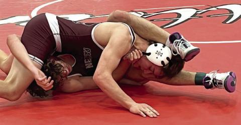 Panther 144 pounder Chandler Winterberg (top) works against an oppponent from Newell at the Battler Wrestling Invitational in Gettysburg on Saturday, Jan. 17. Topic Photo/Denise Perryman
