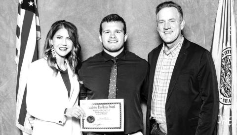 Timber Lake High School’s top senior, Sawyer Holzer, with Gov. Kristi Noem and Lt. Gov. Larry Rhoden