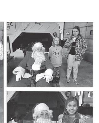 Kids have pictures, hot chocolate with Santa at Isabel