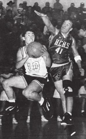Matt Gilbert (41) of Harding County was hot on the trail of Timber Lake’s Deb Ducheneaux (10) in last Friday’s Little Moreau Conference game. Ducheneaux scored two points on this shot and helped the Panthers to an 8-0 lead, early in the first quarter. Deb finished the game with 13 points. Photo by Dyleen Meier Topic, January 30, 1992