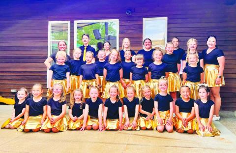 Cloggers perform on Medora stages