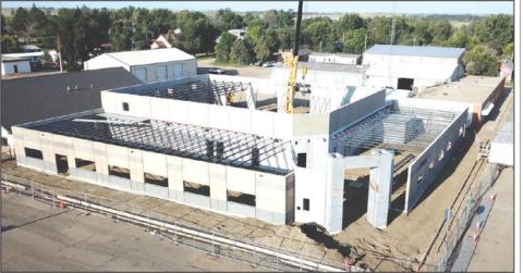 This drone photo taken last week provides an aerial view of the progress being made on the new Moreau-Grand Electric Cooperative headquarers on Main Street of Timber Lake. Visible in the center of the photo is the boom of a large crane that is used to put each prefabricated piece of the structure into place. Photo by Roger Lawien