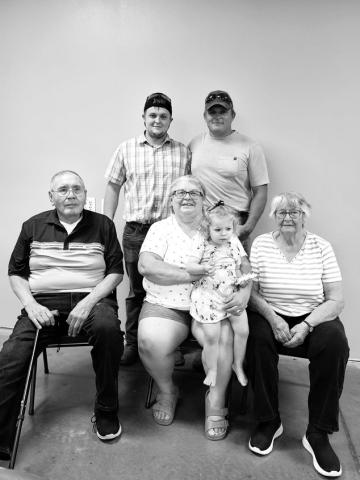 Baby Hope Gracelyn Schuchhardt–Hoyt, held by great-grandma Ethel Hill, is the fifth generation of her family. At right is great-great-grandma Estelle Cook. In back are Teigan Schuchhardt (father) and Adam Schuchhardt (grandfather). At right is Ethel’s husband, John Hill.