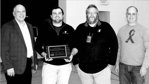 L-R are Loren Paul, SDEA president; Andrew Corley, Sioux YMCA CEO; Mark Barron, YMCA Senior Youth Involvement Director; and Shawn Olsen, who nominated the Sioux YMCA for the Friend of Education Award.