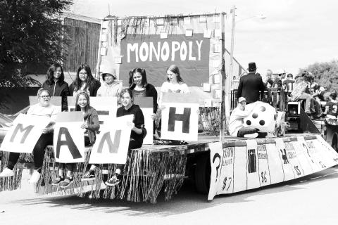 Wyatt Lemke WAS the Monopoly Man character this week! He had that part in the skit and was a key part of the ninth graders outstanding Monopoly themed parade float that took first place in the 7th-9th grade division.