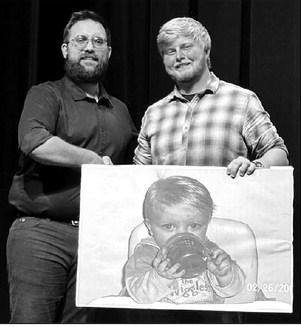 Walker Rose (LEFT) music instructor, presented Shawn Quinn with the 4-year music award.