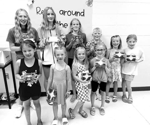 Prize drawing winners who met their Accelerated Reader goals: Front (l-r): Blakely Brown Otter, Lakyn Lindskov, Charlie Long, Elsie Maher, Brie Parker, Rose Maher; Back (l-r): Kamee Mareska, Jaycie Lemburg, Brynn Lemburg, Isaac Schweitzer.