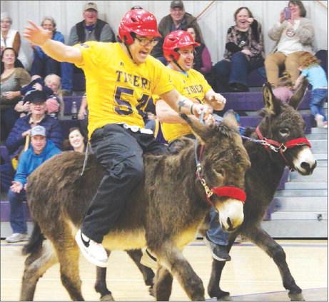 Dupree HS senior Bubba Marshall (left) screams commands to an uncooperative partner during a Donkey Basketball fundraiser presented by the DHS Post-Prom Committee last week. Photo by Patty Peacock
