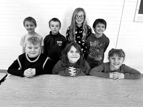 RIGHT, FIFTH GRADE. FRONT (L-R) Autym Red Bear and Maya Biegler (winners); BACK: Bricelyn Pederson and Garrett Nilson (alternates)