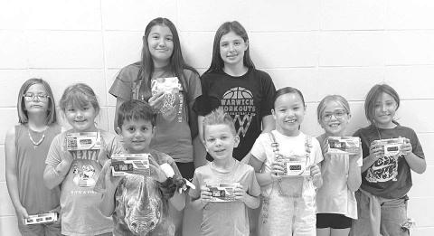 Big prize drawing winners who met their Accelerated Reading goals are: Front (l-r): Azalea Grage, Wren Jones, Pieter Scholtz, Laysen Gimbel, Marie Bad Warrior, Elsie Maher, Cora Wiedmer; Back: Ava Grant, Finley Boldt. Not pictured: Kinzlee Martin.
