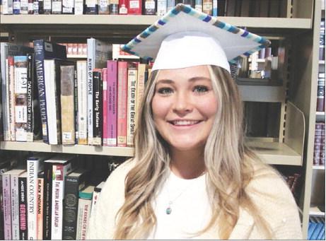 Through the dual-credit program, Timber Lake HS senior Kenna Webb earned enough credits to begin college this fall as a sophomore. Through on-line courses the future teacher garnered 37 dual-credits, the most by a Timber Lake student since the program began. Photo by Jon Flatland