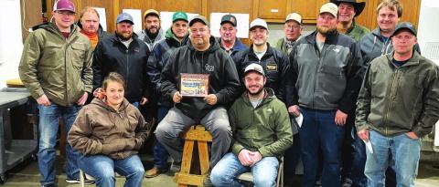 Timber Lake Rodeo Association members at their Dec. 15 annual meeting. SEATED (L-R): Kari Goldade, Richard Gross holding the SDRA Rodeo of the Year plaque, and Brent Schweitzer; BACK: Derek Long, Larry Stapert, Terry Aberle, Ben Bieber, Archie Hulm, Chuck Maher, Shaun Maher, Doug Maher, Chris Aberle, Jace Booth, Bruce Schweitzer, Photo by Kathy Nelson Mark Leibel.