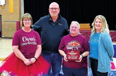 Custodian Deb Linderman (WITH PLAQUE) received one of three Support Staff of the Year Awards, named for the late Missy Stover, school custodian who passed away last year. Also pictured are (L-R) MS/HS Principal Julie Marshall, Supt. Dan Martin, and Elementary Principal Danae Paxton.