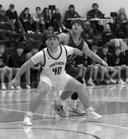 Sophomore Mason Bickel (40) boxes out a Sully Buttes player while watching for a rebound during Timber Lake’s win over the No. 4 ranked Chargers. Topic Photo/Marie DuPreez
