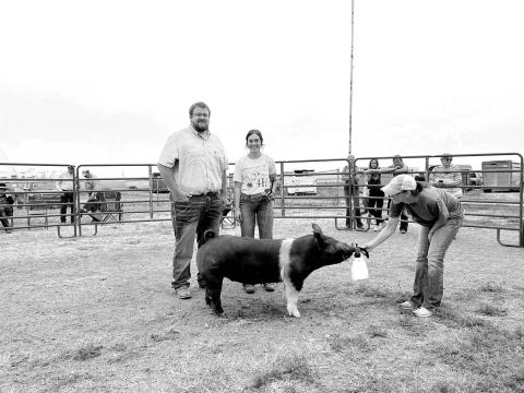 The grand champion 4-H market swine was shown by Merissa Meyer.