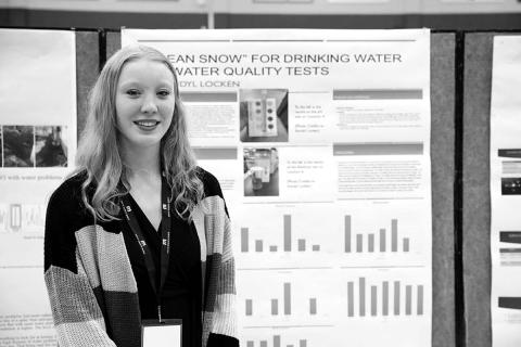 Kendyl Locken with her project at the High Plains Regional Science Fair.