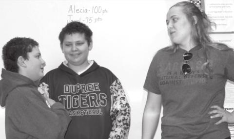 Maverick and Wyatt Lemke role playing on how to say no to vapes being offered to them by an older student, played by their sister Erin Lemke, for the second grade students. Photo by Patty Peacock
