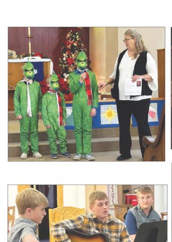 The Zeug brothers (Eli, Andrew and Isaac) took the message “Jesus is not a Grinch” to the Timber Lake Christmas parade and won first place for United Parish Church. They appeared briefly with Vicar Teri Gayer at church on Sunday.