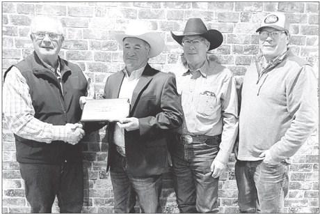 Chuck Maher of Timber Lake was named 2024 South Dakota Charolais Commercial Producer of the Year by the S.D. Charolais Breeders Association. He was presented with a plaque at the Association’s yearly banquet in Watertown on February 7. Pictured (l-r) are a representative of the S.D. Charolais Breeders Association, Chuck, and his brothers, Doug and Jim Maher, who surprised Chuck by attending the banquet.
