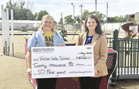 Timber Lake School District was awarded a $20,000 South Dakota Fund grant from South Dakota Community Foundation. Sarah Schweitzer, Timber Lake School District Special Education Director (left) received the check from Jamie Farmen, SDCF Senior Community Development Coordinator (right).