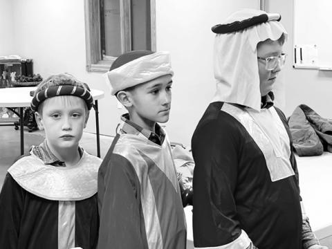“Back stage” awaiting their cue are these three kings (L-R): Mason Hollenbeck, Emmett O’Leary, and Aiden Lindskov.