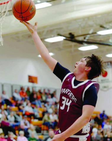 Timber Lake senior forward Rance Martin scored with a nifty finger- roll layup during recent boys basketball action against New Underwood. Photo by Marie DuPreez