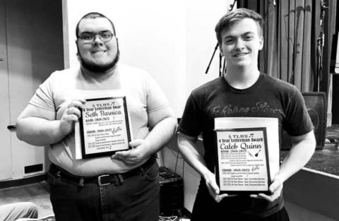 Two TLHS seniors, Seth Barnica (LEFT) and Caleb Quinn (RIGHT) were awarded plaques listing their many accomplishments in both band and choir over four years of high school.