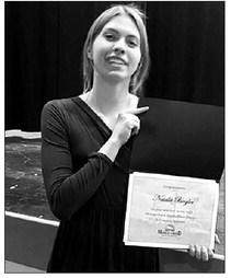 Natalie Biegler was the recipient of the $1000 Moreau-Grand Electric/Basin Electric Scholarship, which was presented by M-G Manager Melissa Maher.