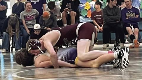 Timber Lake’s Taggen Paxton rides his opponent in a match at the Harding County Wrestling Invitational on Dec. 30. Paxton was 9-8 heading into the tournament and split four matches, moving to 11-10 on the season. Photo by Denise Perryman