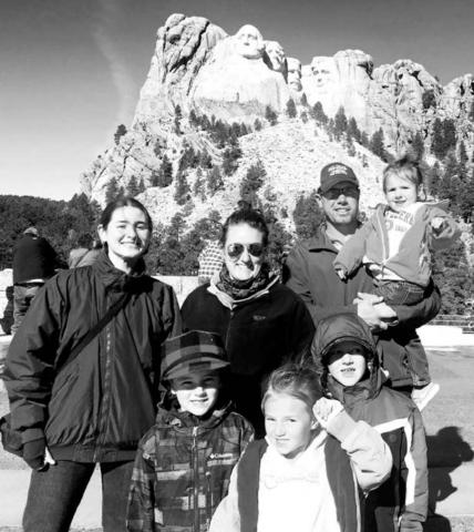 Zoe Crassard (LEFT) with her host family, Kari and Dustin Goldade and children Greyson, Camden, Josie and Lochlyn.