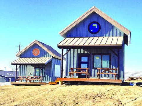 The first two of four tiny homes being built at the YMCA of the Seven Council Fires (Sioux YMCA) Rising Star Community site in Dupree are in place with just the interiors to be finished. Once available, the homes will be used as transitional emergency housing for local families in crisis. Photo by Jon Flatland