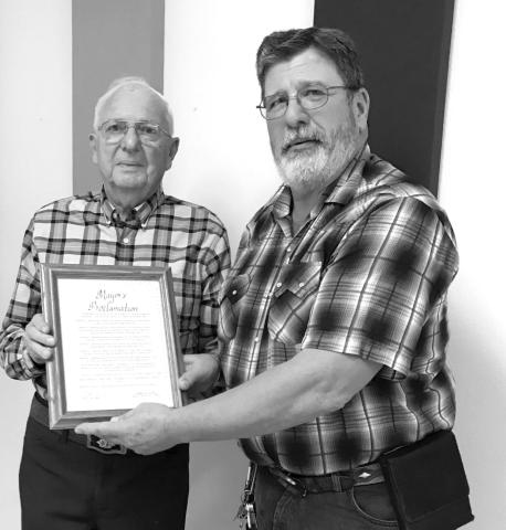 Sam Owen, Mayor of Dupree (RIGHT), presented Ray Lenk with a proclamation from the city council declaring August 14, 2021 as Ray Lenk Day in Dupree. Photo by Vicki Schilling