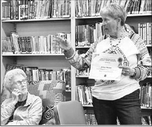 Local author receives another book award