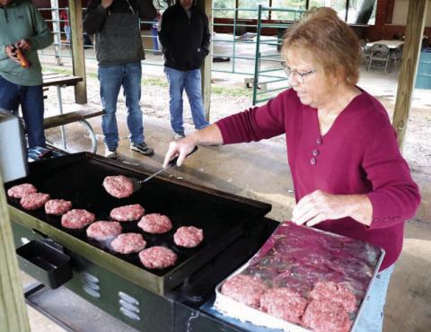 Marcia Maher of Isabel Future Visions manned the grill during Isabel’s July 4th Community Potluck. Due to rain the event was moved from the rodeo grounds into the Pavilion.