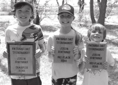 Plaque winners in the fishing tournament at Isabel Lake on Saturday were (l-r) Hayden Bader, first place; Hailey Bader, second place; and Michael Bader, third place.